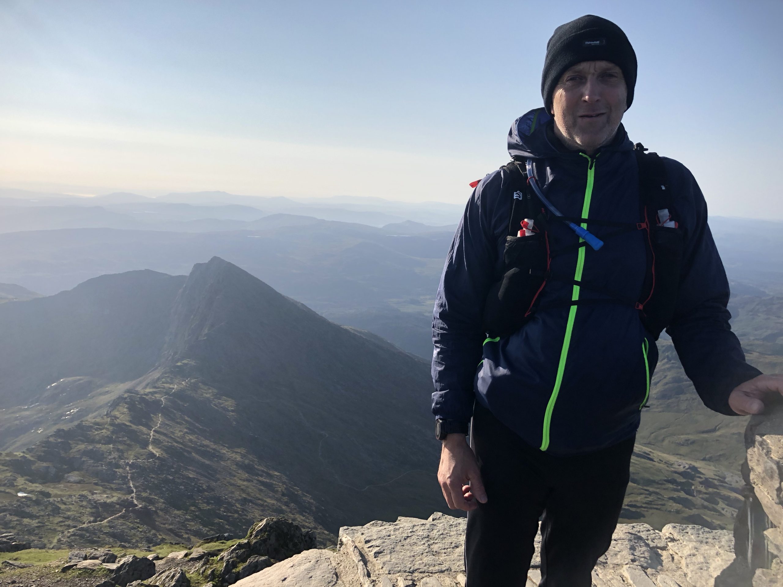 me standing on mountain top.