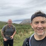 two men on a mountain in Wales