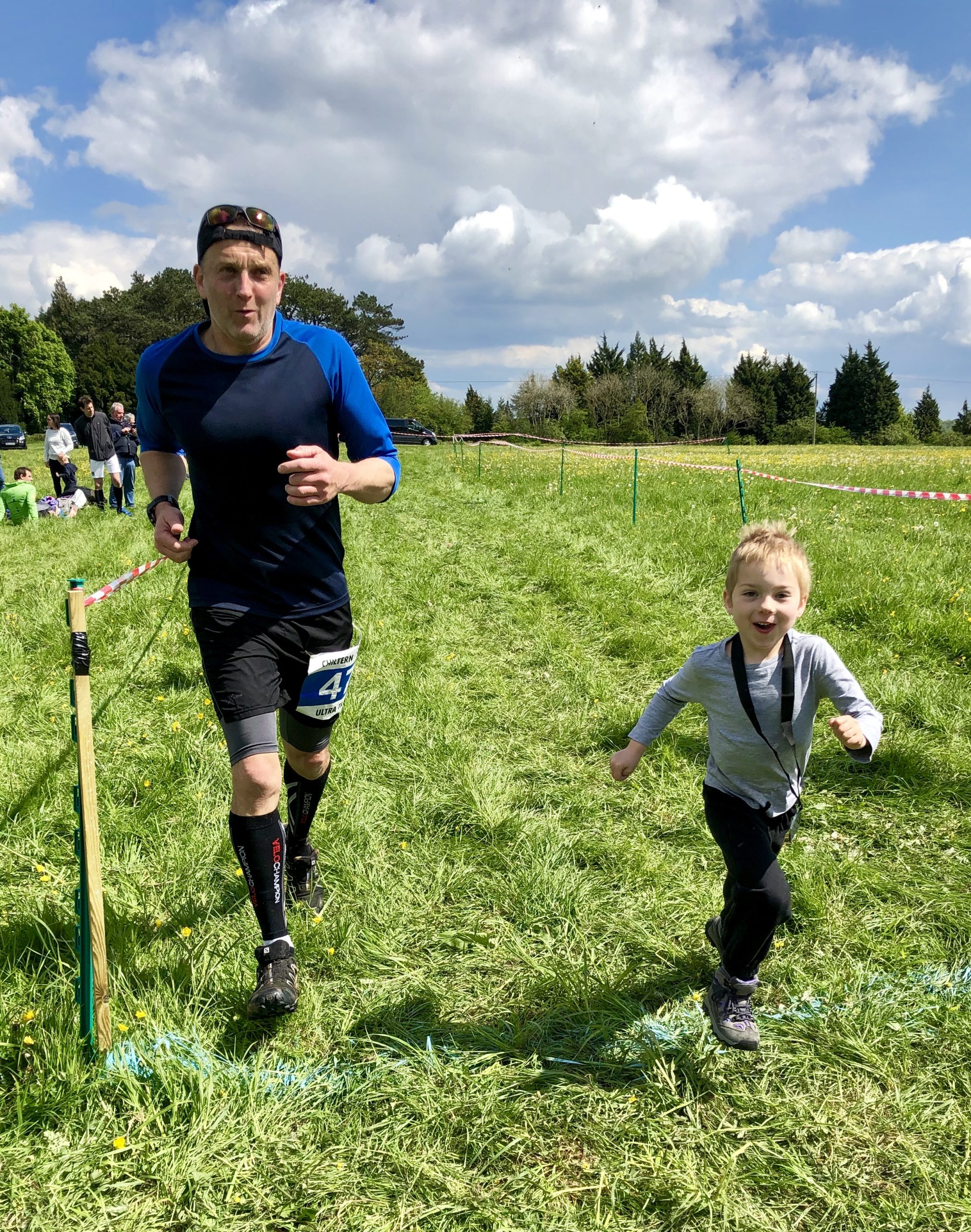 Running beside Coop across a field.