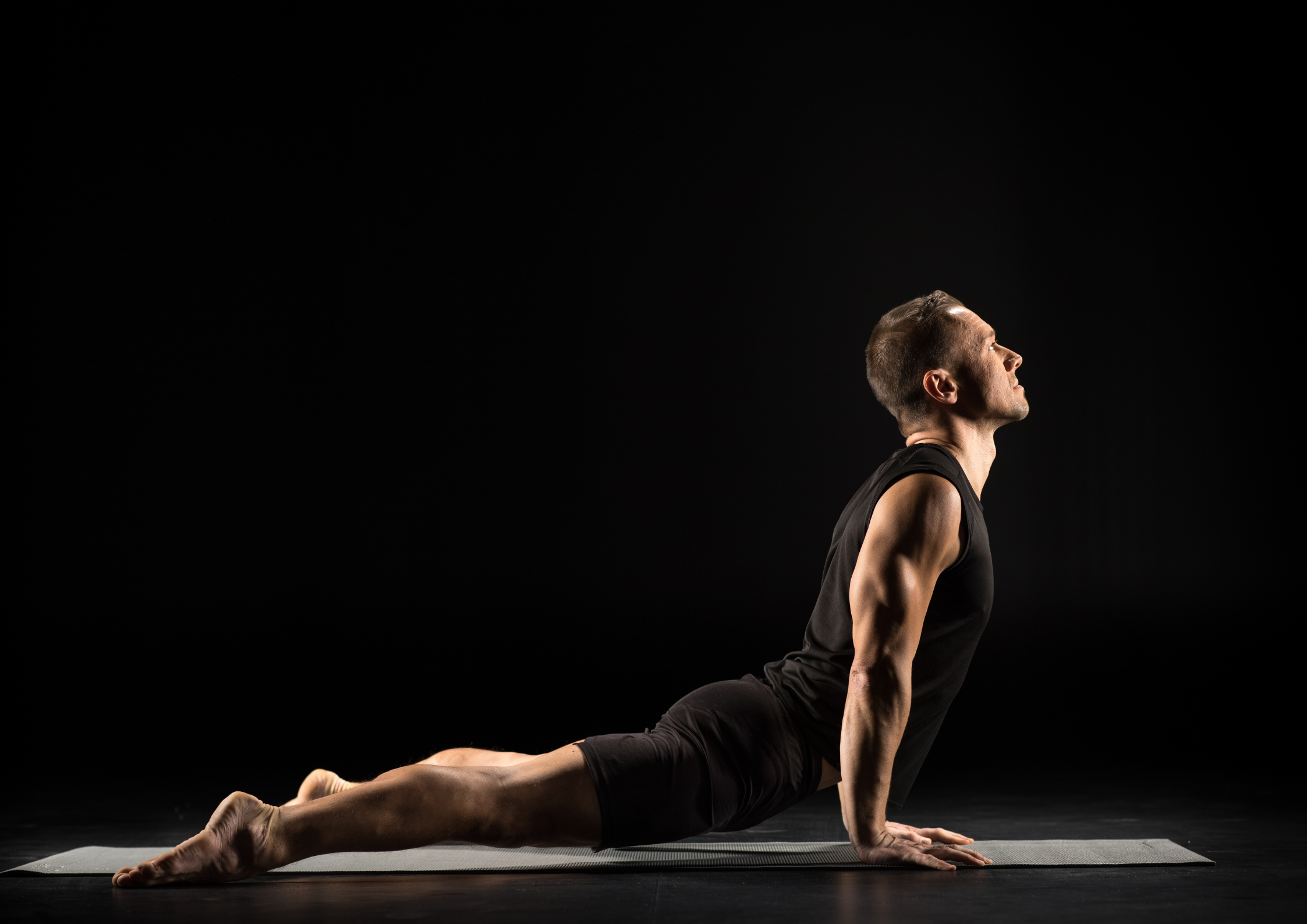 man in yoga posa