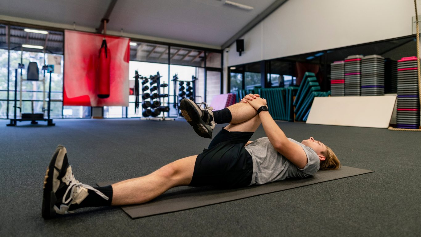 man stretching psoas