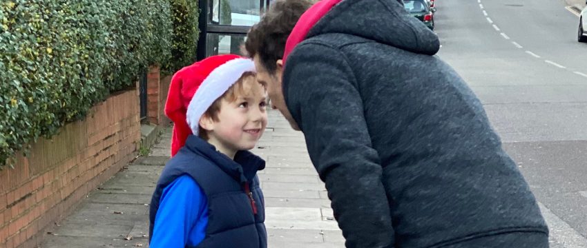 Coop in a santa hat, staring at me