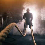 man doing battle ropes