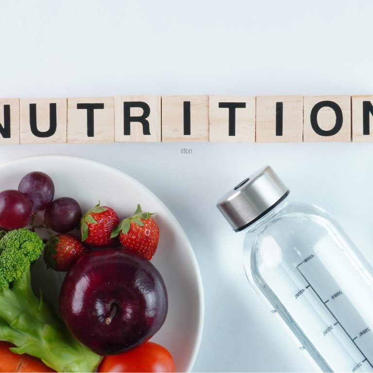image of a bowl of food and cutlery.The word 'nutrition' above