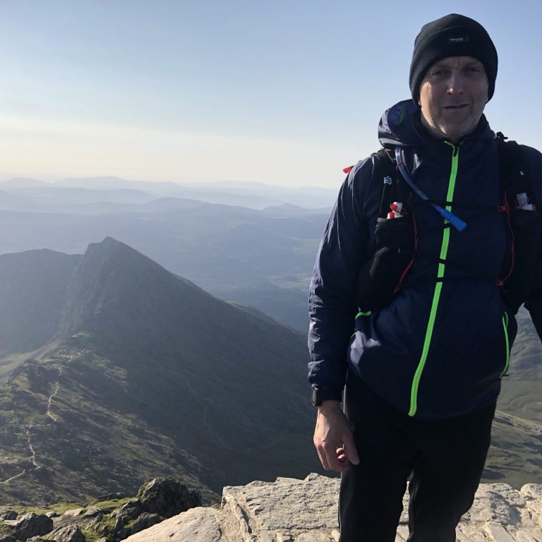 me standing on mountain top.