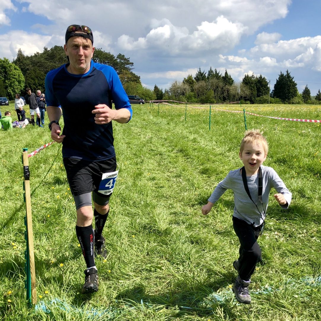 Running beside Coop across a field.